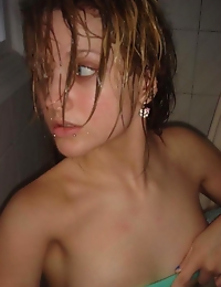 Picture set of a blue-eyed blonde emo babe in the shower